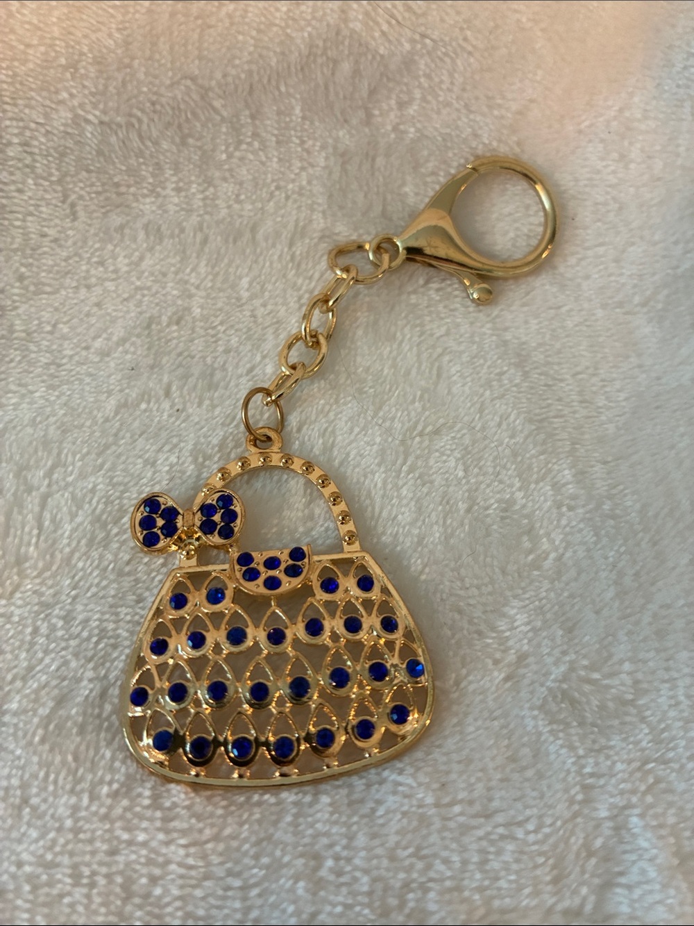 Gold-Tone Purse Keychain with Blue Accents